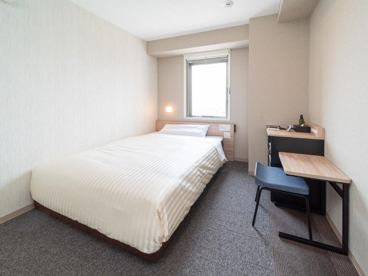 Super Hotel Iyo Saijo Buitenkant foto